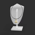 Elegant Gold Pendant Necklace With Black Chain On White Mannequin Stand