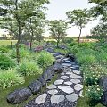 Natural Stone Garden Path Paving With Green Plants Trees And Colorful Flowers