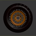Car Off Road Tire With Dark Red Tread And Orange Riveted Rim Design