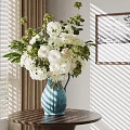 Decorative Ornament Set with Blue Vase White Flowers Greenery on Wooden Table and Wall Art