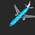 Blue And Silver Large Passenger Airplane Flying With Wings And Engines