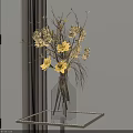 Clear Glass Vase With Yellow And Beige Dried Flowers On Metal Table