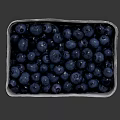 Full of Plump Juicy Fresh Blueberries in Cardboard Container with Label