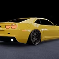 Yellow Chevrolet Sports Car With Sleek Modern Design And Custom Alloy Wheels