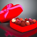 Open Red Heart Shaped Box With Pink Ribbon Bow And Assorted Chocolates