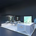 Modern Exhibition Booth Design With White Reception Counter Seating And Display Screens