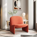 Modern Orange Fabric Accent Chair In Living Room With Side Table And Lamp