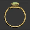 Elegant Gold Ring Featuring Green Gemstone And Intricate Floral Design