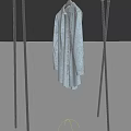 Light Blue Shirt Hanging On Modern Metal Clothes Rack For