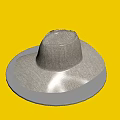 Woven Wide Brim Hat Placed On A Silver Round Plate Surface