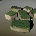 Green Moss Covered Stone Blocks Scattered in Natural Arrangement with Shadow Effects