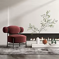 Stylish Red Velvet Single Sofa with Round Arms Metal Legs by Fireplace and Green Plant