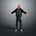 Man in POLICE vest with sunglasses black top and pants arms outstretched on gray background