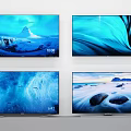 Four Televisions Showcasing Scenic Natural Views Of Mountain Ocean Wave And Beach