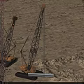 Tracked Crane Functional Vehicle With Extended Boom Performing Lifting Operation At Sandy Site