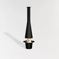 Modern Black Fireplace With Tall Chimney And Burning Flames In Minimalist Setting
