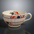 White Ceramic Cup With Colorful Floral Pattern And Scalloped Rim Design
