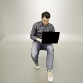Man Using Black Laptop While Sitting In Casual Outfit On Gray Background 3d model