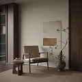 Neutral Tone Accent Chair With Small Side Table Wall Art Branch Vase In Minimalist Interior