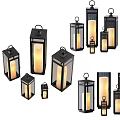 Modern Design Black Frame Candle Lanterns In Various Sizes With Illuminated Candles