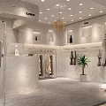 Modern Clothing Store Interior With Garment Racks Display Shelves Chandelier Potted Plant And Marble Walls