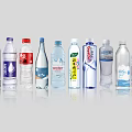 Assorted Bottled Water From Different Brands With Transparent Bottles And Label Designs