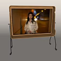 Sleek Modern Television Screen With Metal Stand Displaying Night Scene Person