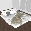 Double Floor Bed With White Comforter Pillows Beige Throw And Geometric Floor