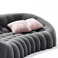 Modern Gray Curved Sectional Sofa with Tufted Texture and Pink Cushions