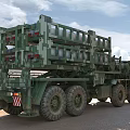Camouflaged Military Missile Launch Vehicle With Elevated Launcher In Desert Terrain