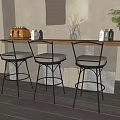 Stylish Bar Counter With Wooden Top Stone Base Three Bar Stools Decorations And Green Plant