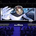 Modern Cinema With Large Screen Displaying Robot Figure And Audience Watching Movie Presentation