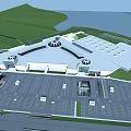 Large Modern Building With Domed Roofs Parking Lot Green Landscaping And Waterfront