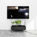 Modern Black TV Stand With Scalloped Design Green Plant And Vase Under TV Screen