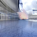 Modern Commercial Complex With Streamlined Glass Curtain Wall And Waterfront Reflection In Scenic Landscape