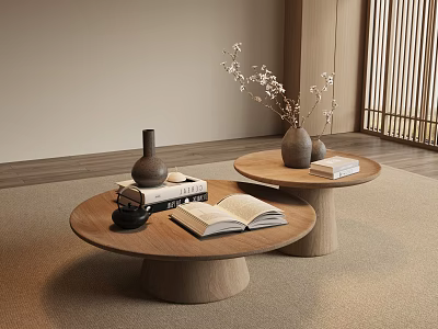 Two Round Wooden Coffee Tables With Open Book Stacked Books Vase And Small Black Cup 3d model
