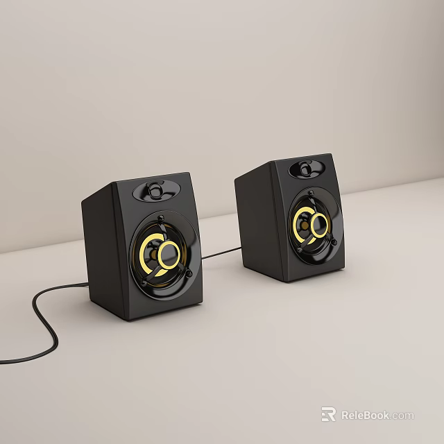 Two Black Speakers with Yellow Ring Accents and Connected Cable on Light Colored Surface 3d model 