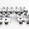 Multiple Office Desks in Open Office Layout with Green Plants Computers and Office Chairs
