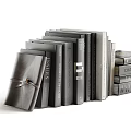 Stacked Books and Magazines with Different Sizes in Vertical and Horizontal Arrangements