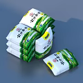 Stacked Edible Salt Packages With Green White Design And Chinese Characters