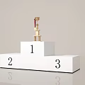 Interactive Zone Featuring White Podium With Gold Trophy And Numbers 1 2 3