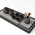 Black Ceramic Tea Set with Teapot Cups and Utensil Holder on Modern Tray