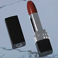 Luxury Red Lipstick with Silver Metallic Detail and Black Case Design