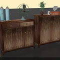 Vintage Wooden Cabinets With Blue Bottles Fan Potted Plant And Mirror