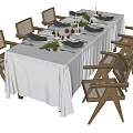 Dining Table Set With White Tablecloth Wooden Chairs Woven Backrest And Decorative Plants
