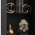 Modern Black Frame Display Cabinet With Glass Door Wooden Shelves And Golden Decorative Items