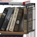 Sturdy Metal Storage Shelf With Various Books And Decorative Covers