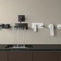 Modern Wall Mounted Black And White Faucets With Flowing Water And Sink