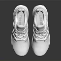 White Sports Sneakers with Knitted Upper White Sole Laces and Reflective Surface on Dark Background