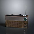 Vintage Electronic Radio With Brown Silver Design Black Handle And Antenna